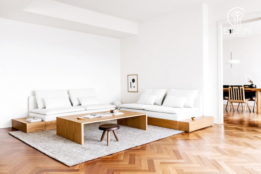 Mẫu 2: Phòng khách kiểu Nhật với tường trắng, sofa trắng kết hợp với sàn gỗ