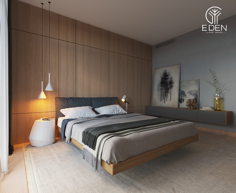 Bức tường phía đầu giường với thiết kế ốp gỗ độc đáo và sang trọng