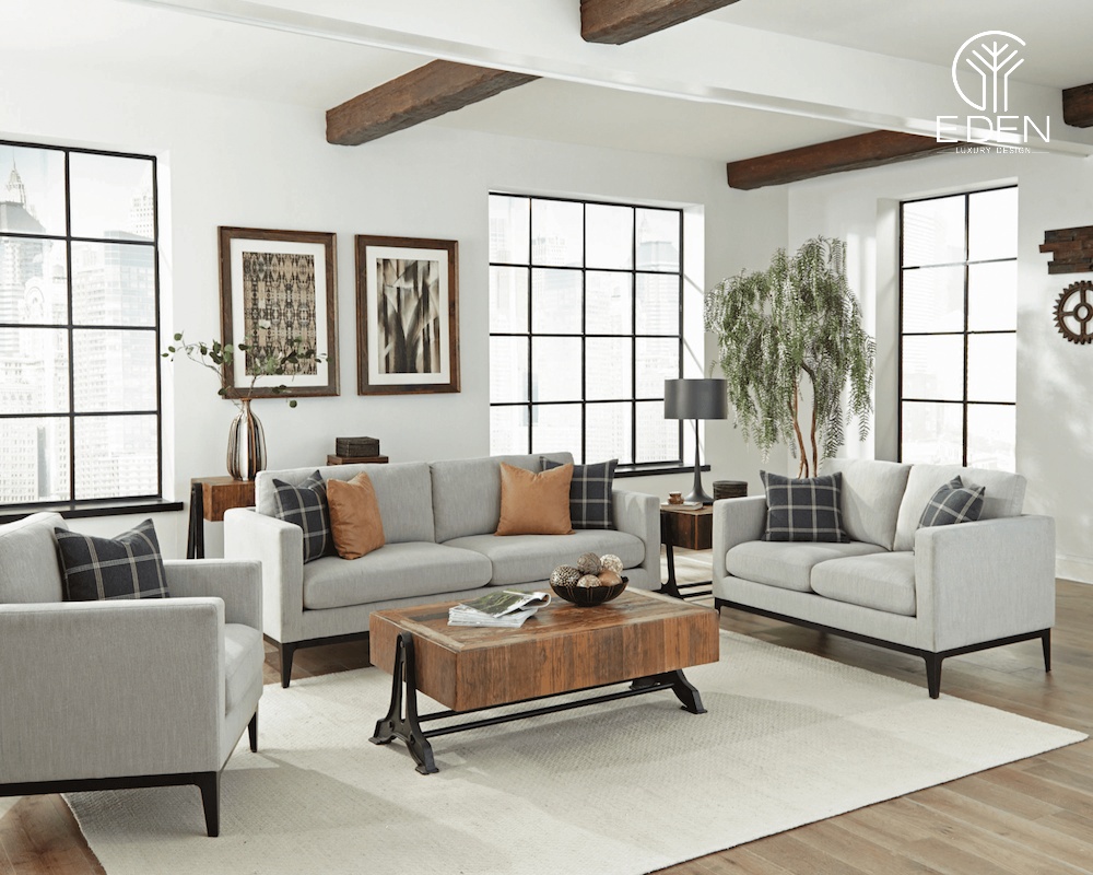 Phòng khách bàn gỗ kết hợp với ghế sofa màu trắng xám