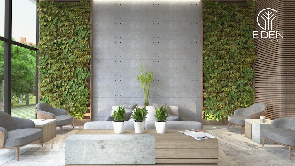Một mẫu tường bê tông kết hợp trang trí lá cây nhân tạo mang cảm giác gần gũi với thiên nhiên