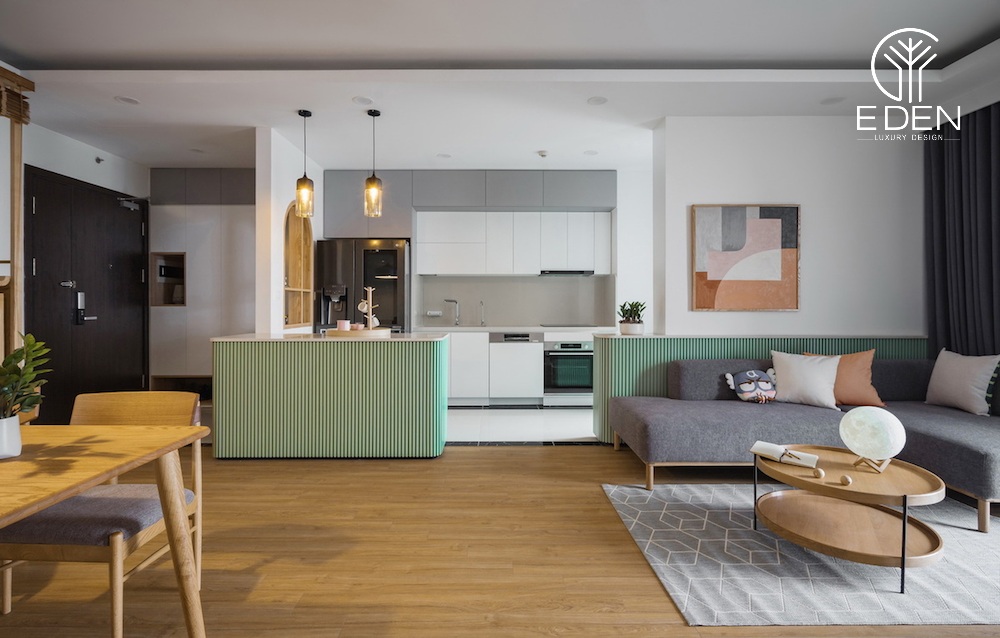 Phòng khách đi liền phòng bếp trong thiết kế không gian mở dành cho căn hộ chung cư
