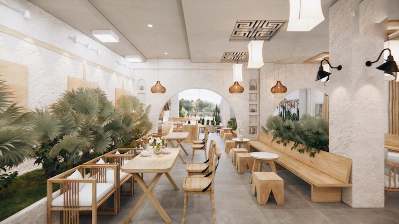 Sự kết hợp giữa màu trắng và nâu gỗ giúp không gian cafe phong cách Địa Trung Hải ấm áp hơn