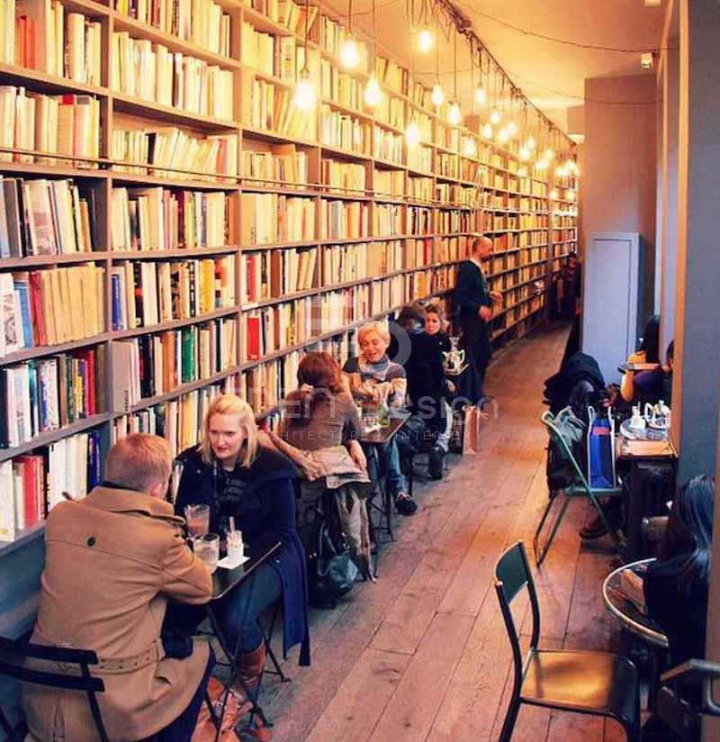 Tiệm cafe có chỗ ngồi ngay cạnh tủ sách